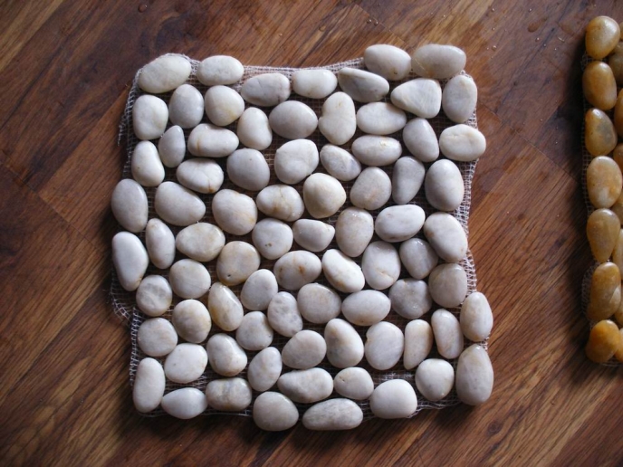 White pebbles net post--2